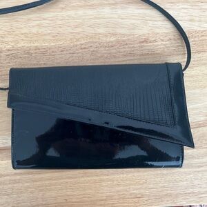 Vintage asymmetrical patent leather bag